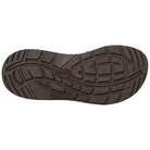 The image shows the tread pattern on the dark brown rubber sole of a Chaco Z/Cloud - Women sandal, featuring curved grooves and the word Chaco embossed in the center.