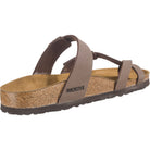 The Birkenstock Mayari Oiled Leather - Women sandal features brown oiled leather, a contoured footbed, adjustable straps, and a textured black sole, shown from the back side angle on a white background.