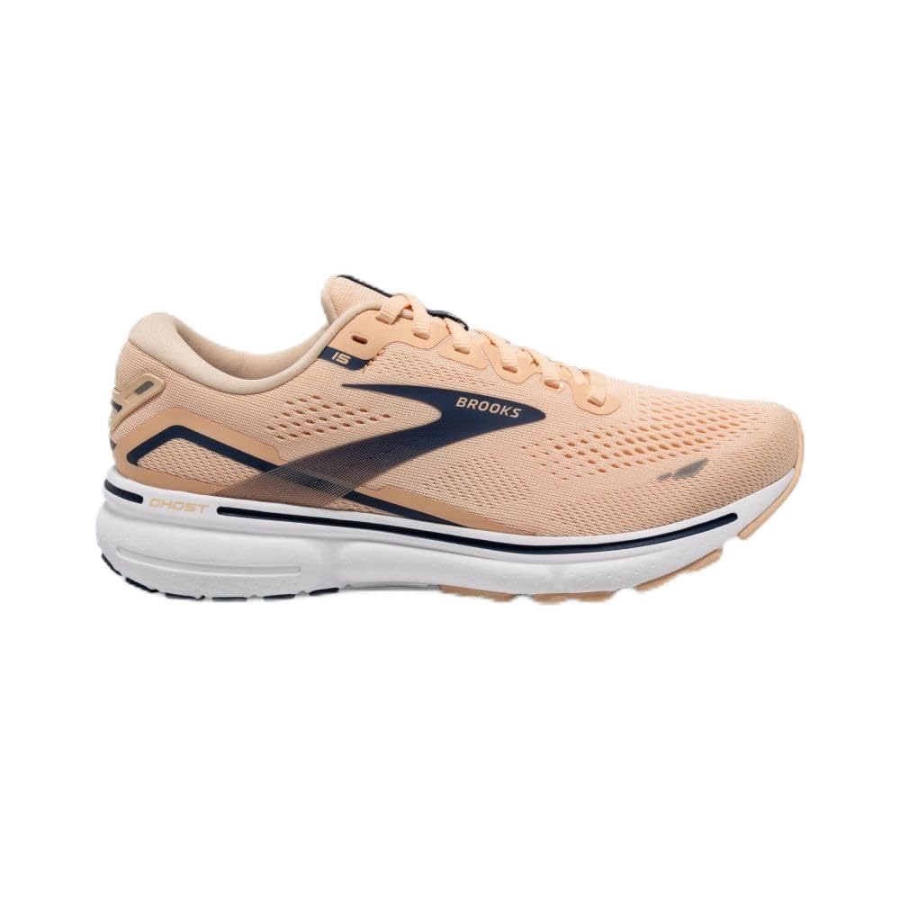 The Brooks Ghost 15 - Women features an apricot upper with estate blue accents and a white sole, shown from the side against a plain white background.