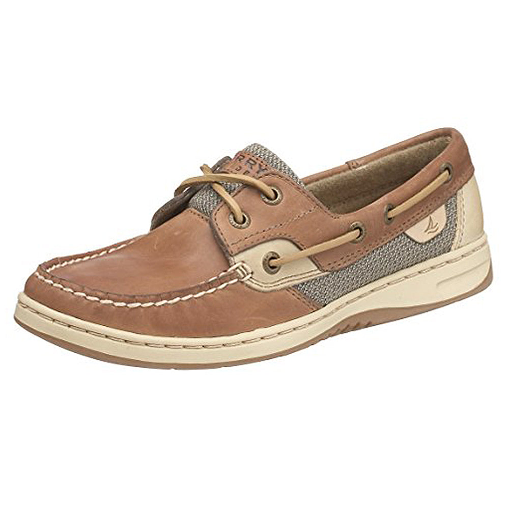 The Sperry Bluefish - Women boat shoe in Linen Oat features brown leather accents, white stitching, lace detail, a rubber sole, textured fabric side panels, and an embroidered logo near the heel.