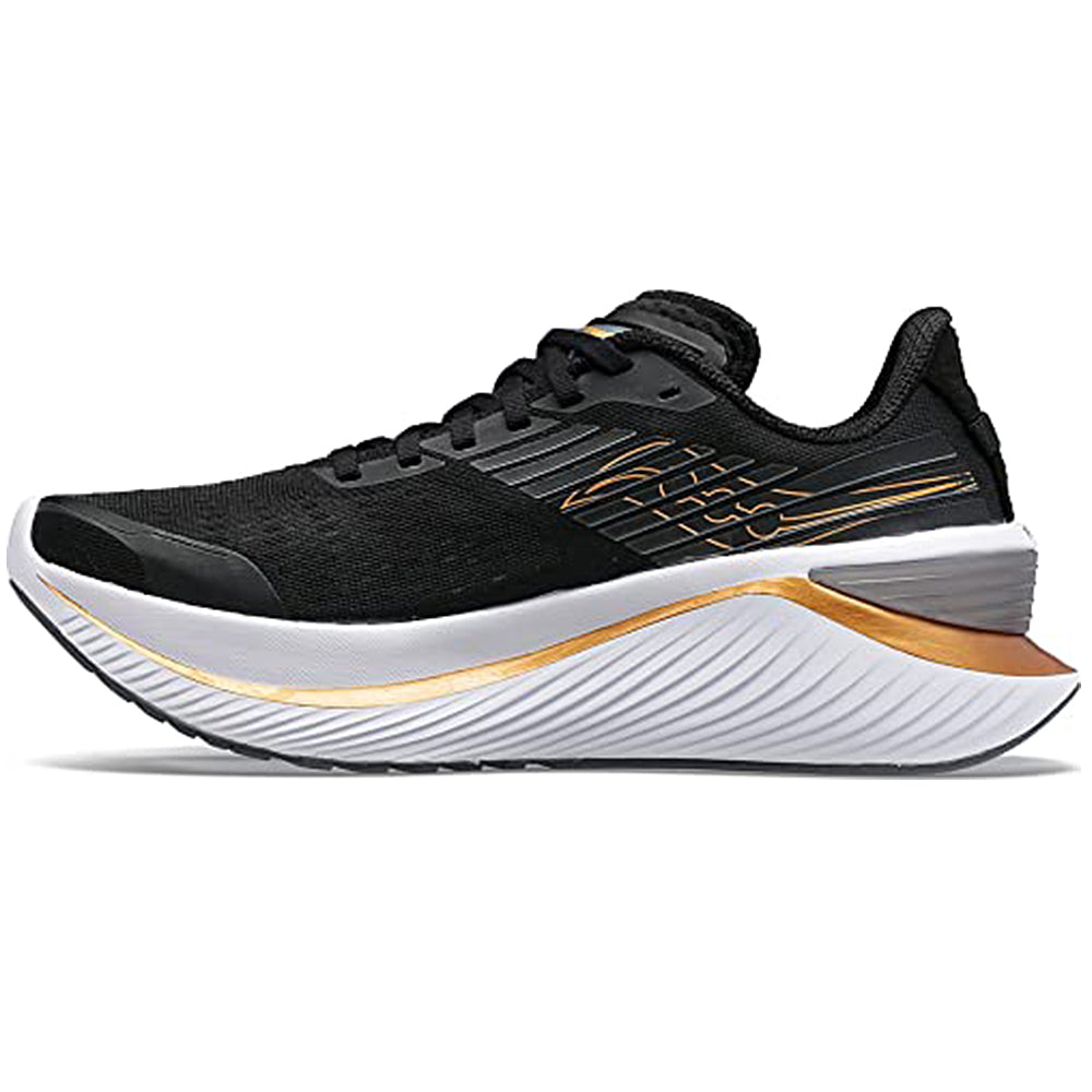 The Saucony Endorphin Shift 3 - Men in Black/Goldstruck features gold and white accents, a thick curved SPEEDROLL sole with PWRRUN foam for a smooth ride, and a sleek side profile shown against a white background.
