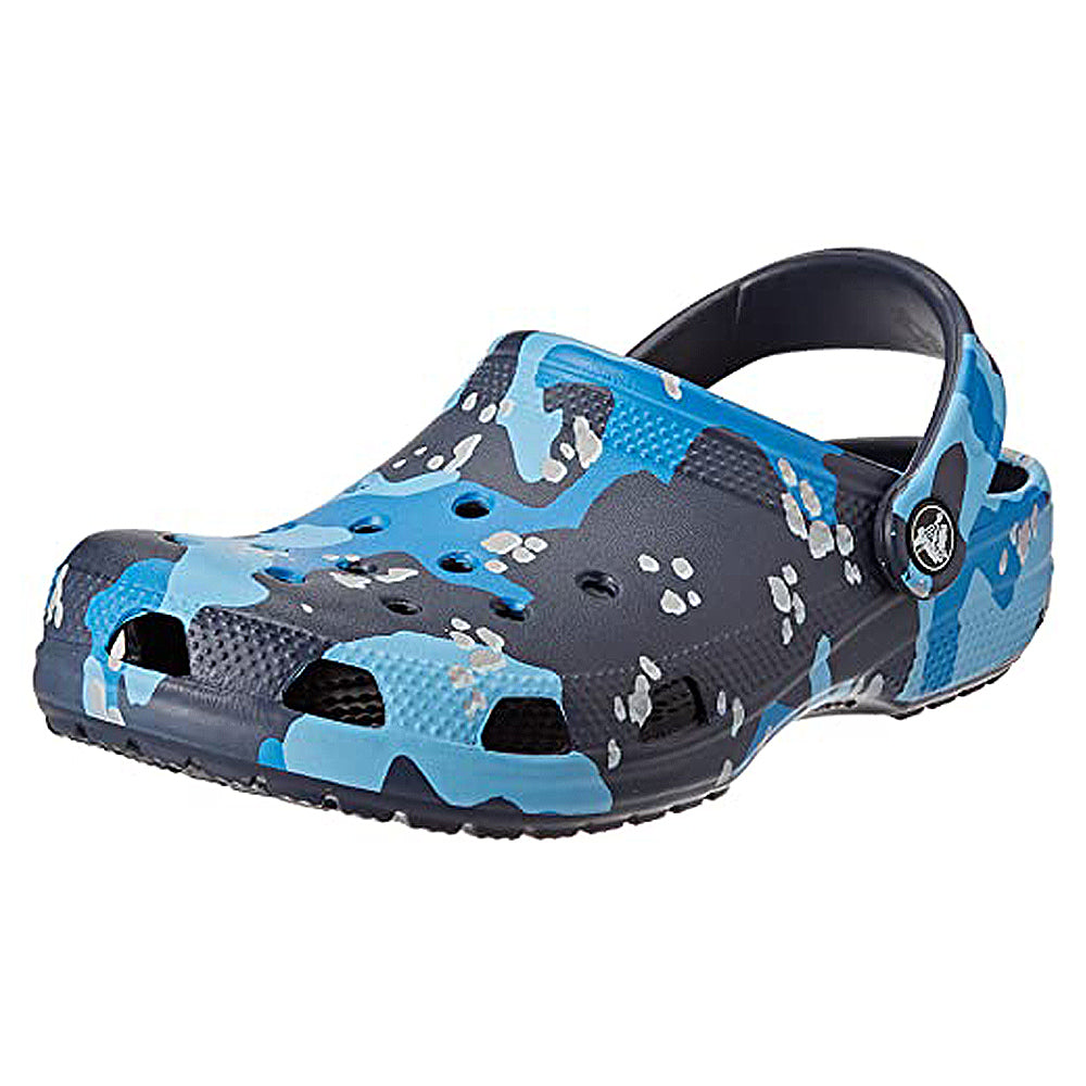 The Crocs Classic Camo Clog - Unisex in Navy/Multi features a signature camo pattern, heel strap, and ventilation holes for comfort—perfect slip-on water shoes in the iconic Crocs design.