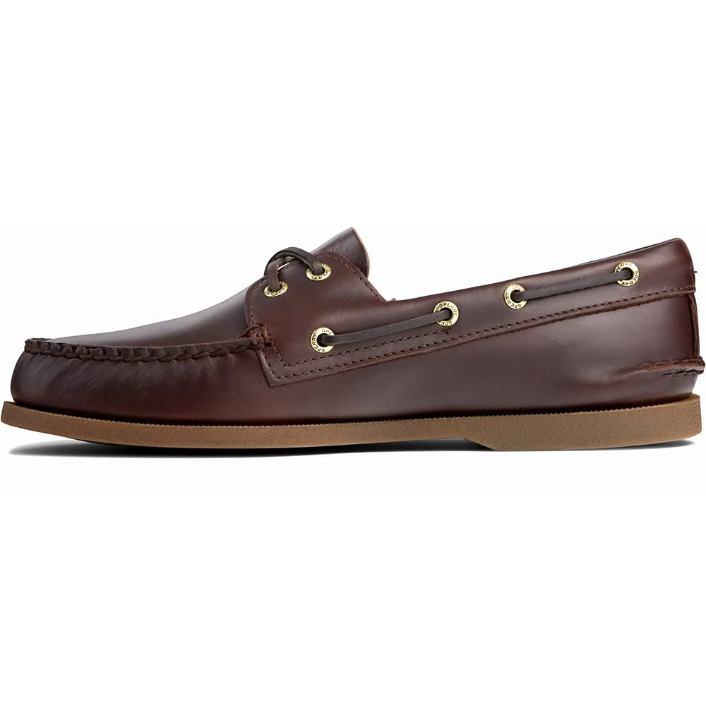 The Sperry A/O 2-EYE LEATHER - Mens boat shoe in AMARETTO features a brown leather upper, tan rubber sole, gold eyelets, and leather laces, displayed in a side profile view.