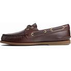 The Sperry A/O 2-EYE LEATHER - Mens boat shoe in AMARETTO features a brown leather upper, tan rubber sole, gold eyelets, and leather laces, displayed in a side profile view.