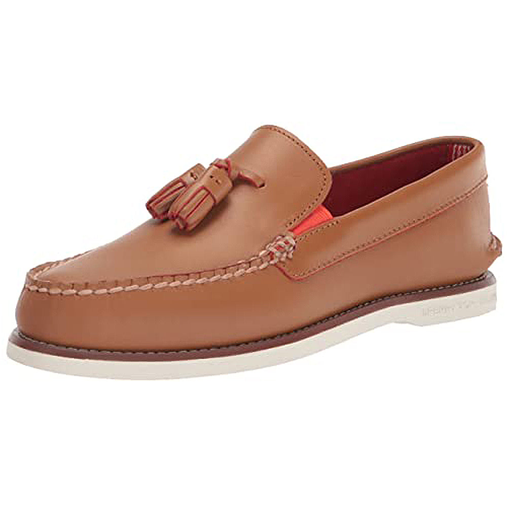The Sperry Authentic Original Tassel Loafer for men features tan suede leather, a white sole, visible stitching, red interior lining, and a cushioned Ortholite insole for comfort.