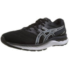 The ASICS Nimbus 23 - Mens running shoe features a black upper with white and gray accents, the signature ASICS logo on the side, and a wavy white midsole designed for superior cushioning and shock absorption.