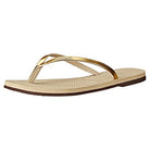 The Havaianas Slim Metalic - Womens sandal in Sand Grey/Light Gold features metallic gold straps and a textured sole, styled after classic Havaianas and shown against a white background.