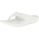 A single Telic Footwear Energy Flip Flop - Unisex sandal in Snow White features pillow-soft cushioning, a textured footbed, arch support, and a slightly elevated sole, shown at an angled front-right view.