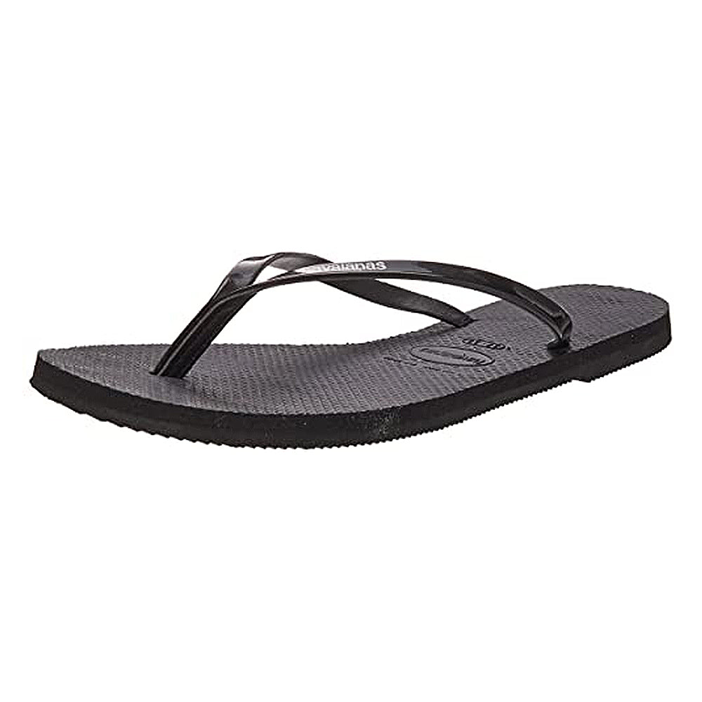 The Havaianas Slim Metalic - Womens flip flop in black features thin, glossy straps and a textured sole, displayed at an angle on a plain white background.