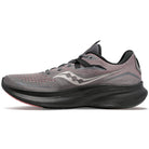 The Saucony Ride 15 - Womens in Charcoal/Shell features a mesh upper, black laces, a white wavy logo, and a thick textured black sole with PWRRUN cushioning. The shoe is shown in profile, facing left.