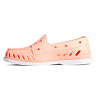The Sperry Authentic Original Float Boat for women in peach is a slip-on rubber shoe with ventilation holes, drainage gills for water flow, and a white sole with wave-siping traction, shown from the side on a white background.