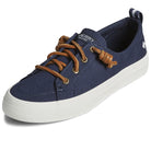 The Sperry Crest Vibe - Womens in Navy features brown leather laces, white stitching, a white rubber sole, metal eyelets, arch support for comfort, and a small white brand logo on the heel.
