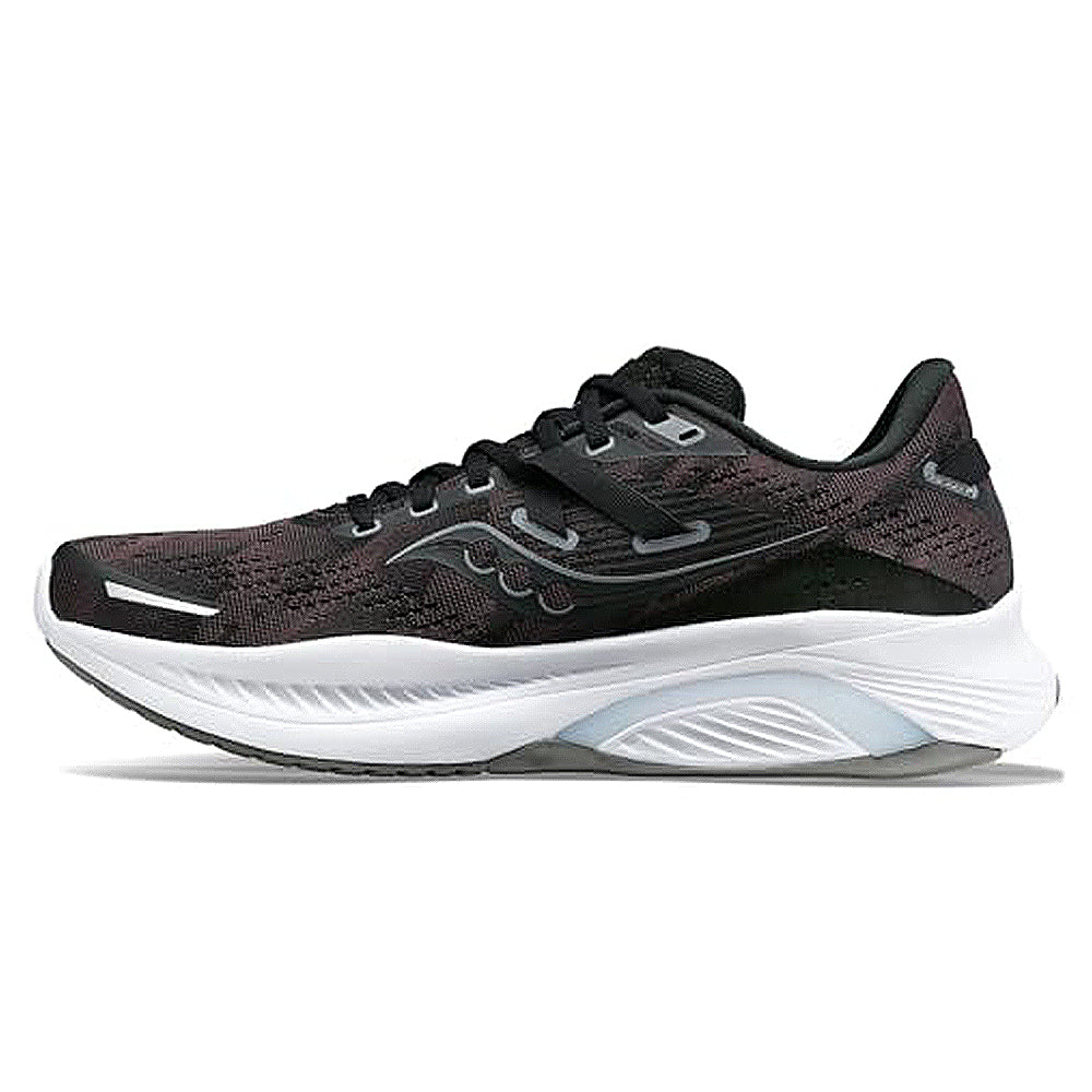 The Saucony Guide 16 Running Shoe - Mens in Black/White features a mesh upper, branded side logo, cushioned sole, and slightly elevated heel—experience comfort and support on every run.