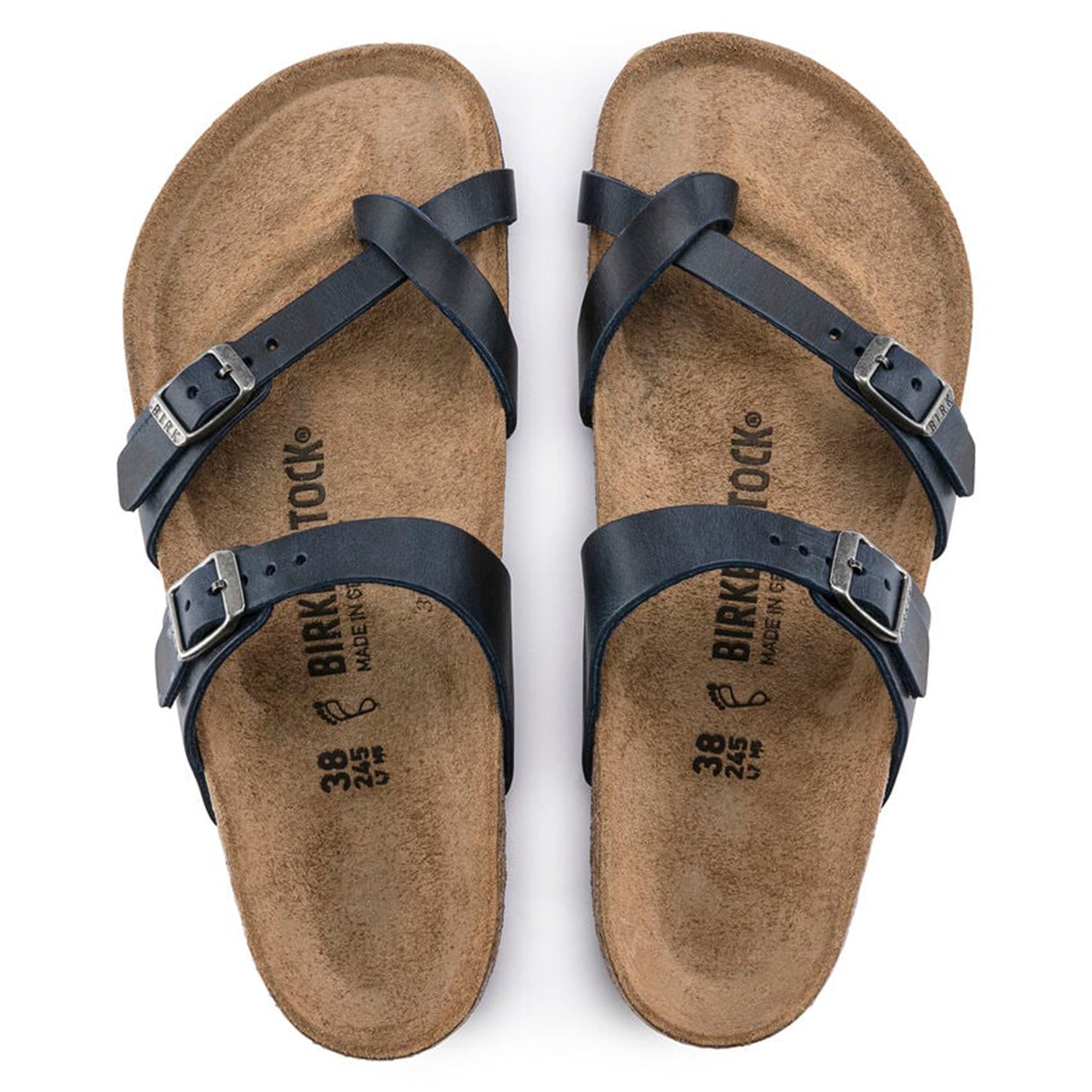 The Birkenstock Mayari Oiled Leather - Women sandals feature dark blue oiled leather crisscross straps with adjustable metal buckles and a contoured cork footbed, shown from above on a white background.