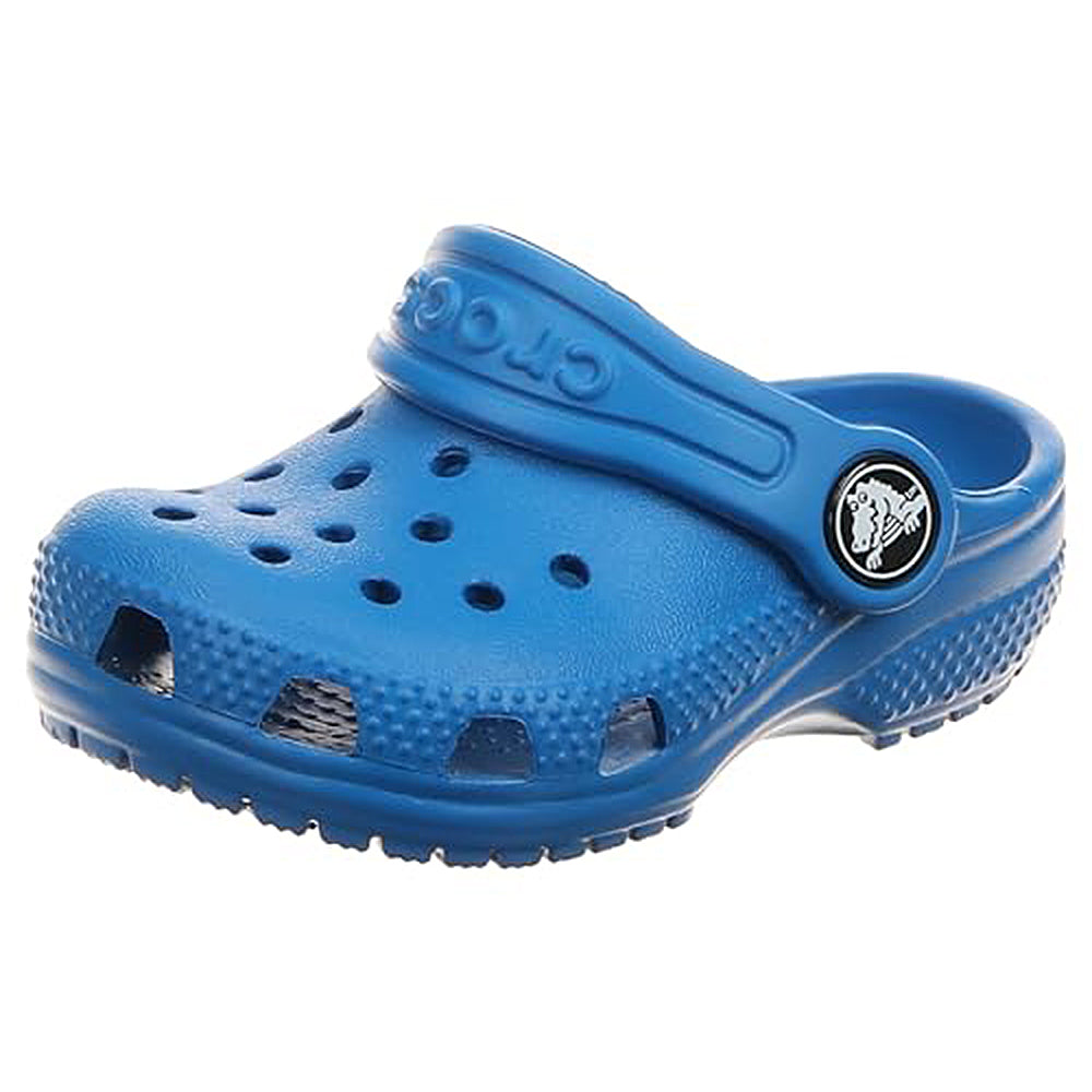 The Crocs Classic Clog - Kids in Bright Cobalt features ventilation holes, a textured sole, and an adjustable heel strap with a small circular logo.