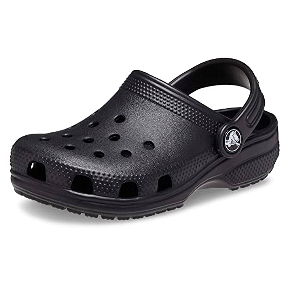 The Crocs Classic Clog - Kids in black features ventilation holes, a textured sole, and an adjustable heel strap with the Crocs logo—perfect for everyday comfort.
