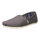 A single TOMS Classic Canvas - Men shoe in Ash Canvas, featuring a classic slip-on design, white rubber sole, small side tag, and a multicolored striped inner lining.