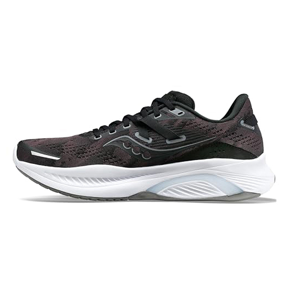 The Saucony Guide 16 Running Shoe - Womens, in Black/White, features mesh uppers and thick white soles for cushioned support, shown from the side.