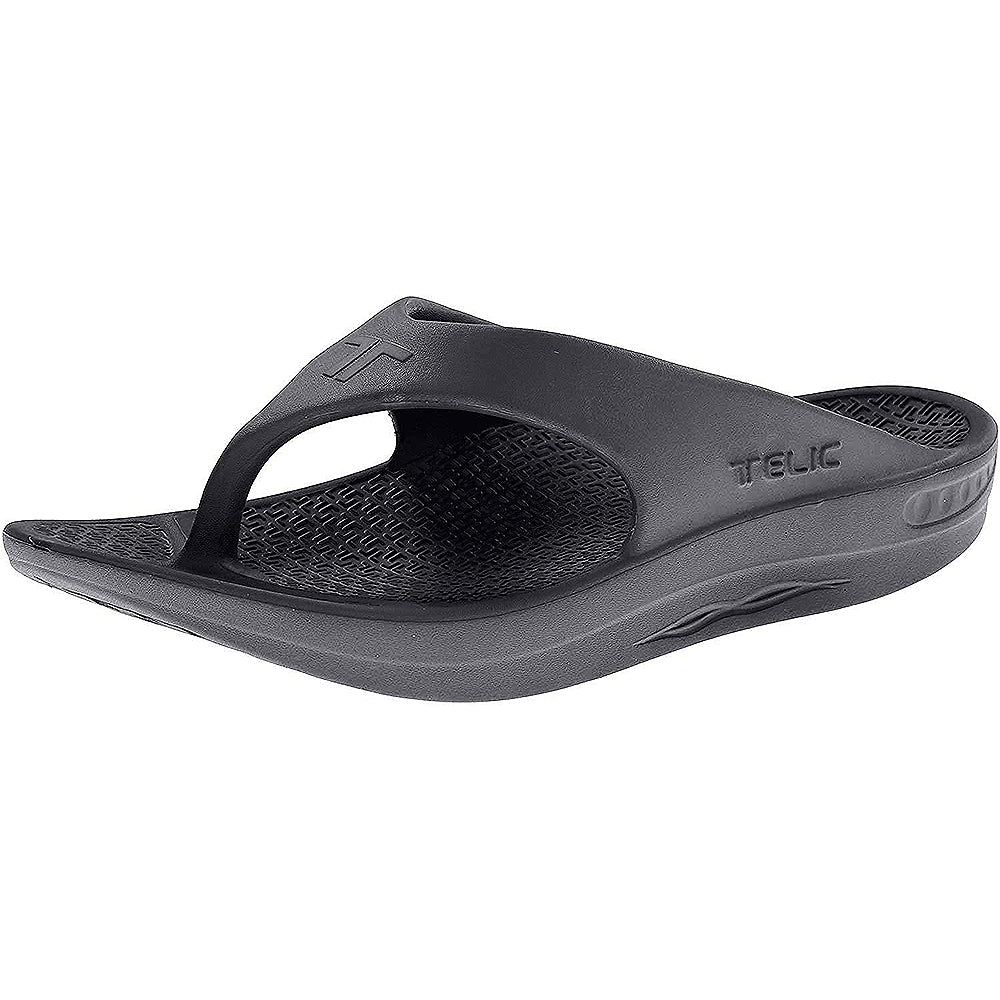 The Telic Footwear Energy Flip Flop - Unisex in Midnight Black features a thick, pillow-soft cushioned sole and textured footbed, delivering outstanding comfort and arch support with every step.