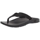 The Chaco Classic Flip - Men in Solid Black features wide fabric straps, a cushioned LUVSEAT PU midsole, and a textured ChacoGrip rubber sole for comfort and durability—all in a sleek, minimalist design.