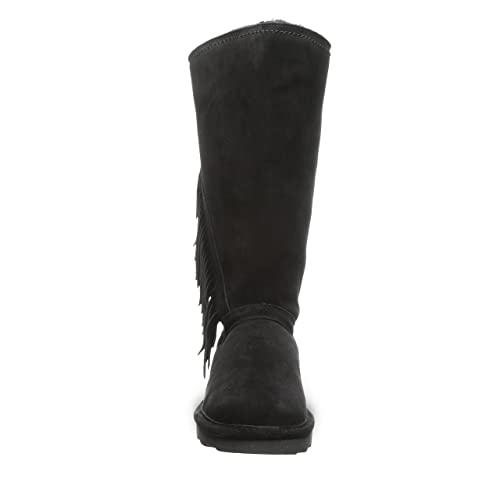 Front view of the BEARPAW Tamara Boots for women, featuring tall black suede, a flat sole, and fringe detailing on one side—showcasing the brand’s signature style.