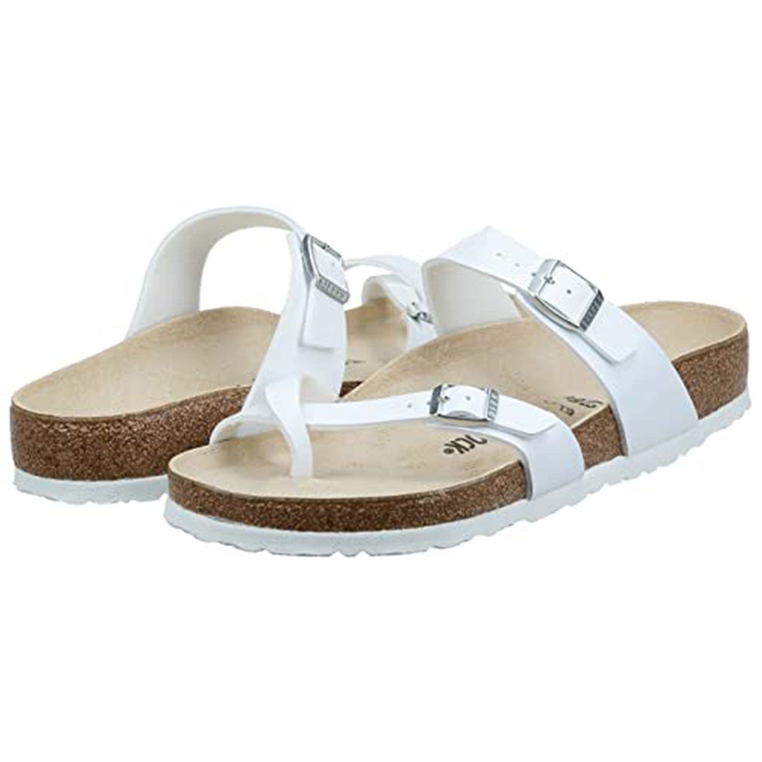 The Birkenstock Mayari Oiled Leather sandals for women feature a white finish, cork soles, adjustable straps with silver buckles, a contoured footbed, and a toe loop, shown against a white background.