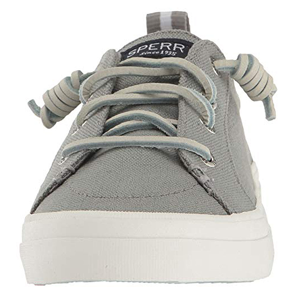 Front view of a gray Sperry Crest Vibe - Womens sneaker with light laces, white rubber sole, arch support, and fabric tongue tag showing the Sperry logo and Since 1935.
