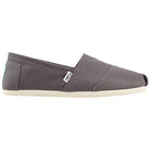 A single gray TOMS Alpargata ESP - Women slip-on with a white sole, shown from the side. Features subtle stitching, classic slip-on design, TOMS label, and supports the brand’s buy one give one mission.