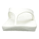 The Telic Footwear Energy Flip Flop - Unisex features a thick sole, open toe, two arching straps, pillow-soft cushioning, and a textured footbed in a crisp white design.