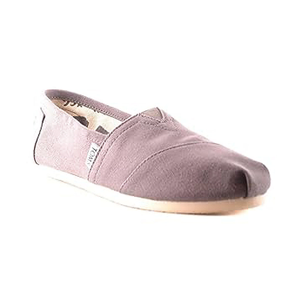 A single light purple TOMS Classic Canvas - Men alpargata with a canvas upper, beige sole, and a small fabric TOMS tag on the side, displayed on a white background.