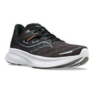 The Saucony Guide 16 Running Shoe - Womens features a black and gray design with cushioned support, a thick white sole, gray accents, and orange GUIDE 16 text on the side; shown from the front left angle.