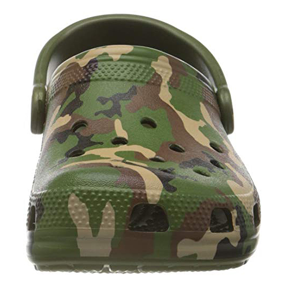 A front view of the Crocs Classic Camo Clog - Unisex, a green slip-on shoe with a camouflage pattern, ventilation holes, textured toe, and pivoting heel strap—ideal for comfortable water wear.