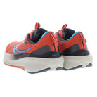 The Saucony Echelon 9 Running Shoe for women is shown from the back and side in red with blue accents and white soles, featuring a seamless upper design for added comfort around the heel and sides.