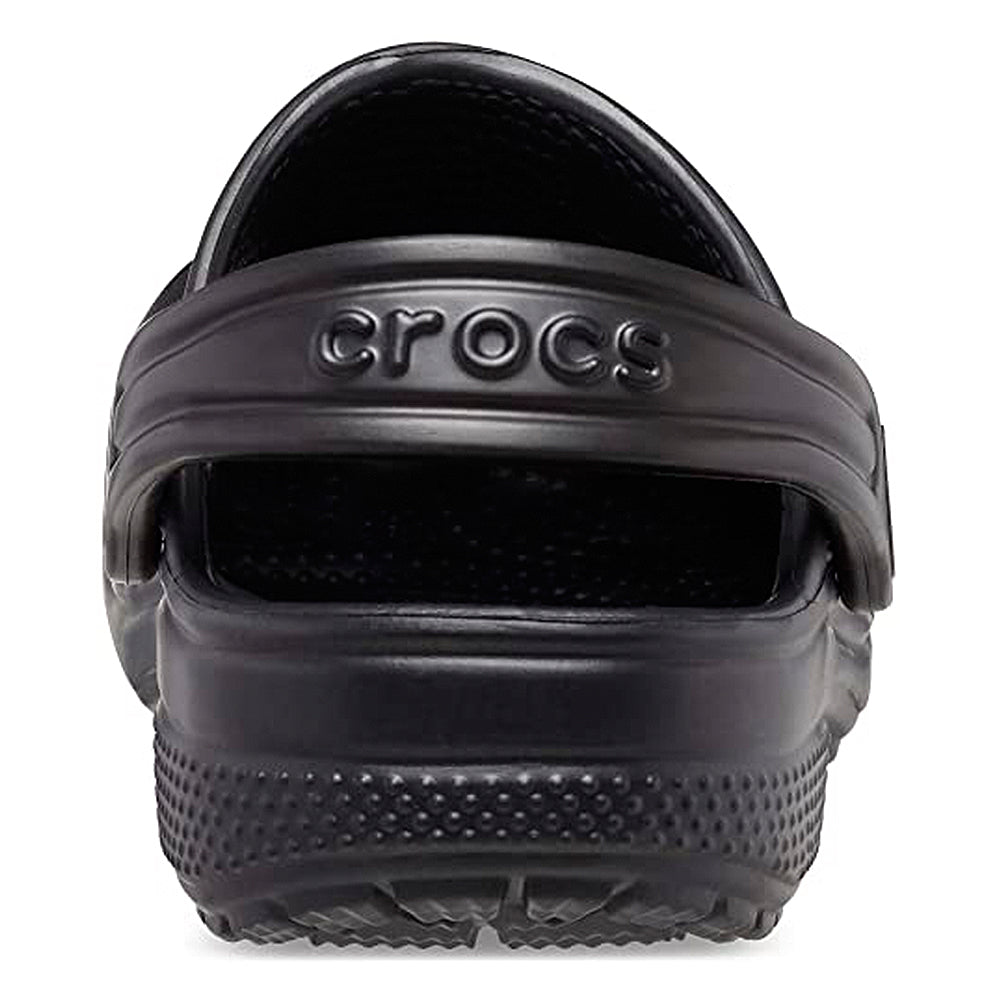 Rear view of Crocs Classic Clog - Kids in black, showcasing the branded heel strap and textured rubber sole—ideal for childrens footwear.