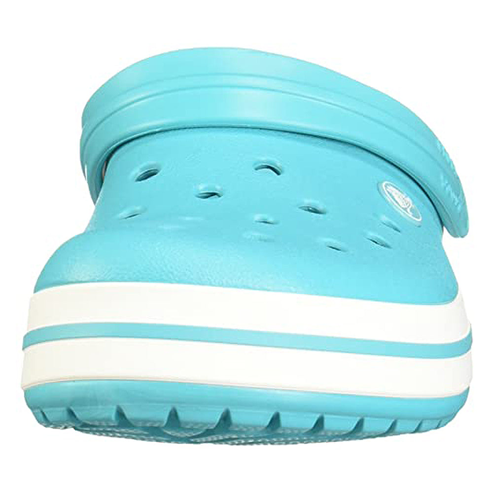 The Crocs Crocband Clog Seasonal Colors - Unisex is shown from the front in light blue, featuring ventilation holes, a white and blue striped sole, and a pivoting heel strap.
