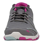 The Ryka Influence - Women cross-trainer in gray features pink and white accents, shown from the front to highlight its laces, toe, and sole tread pattern.