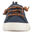 A front view of Sperry Crest Vibe - Womens sneaker in durable navy blue, featuring brown leather knot laces, a white rubber sole, SPERRY branding on the tongue, and comfortable arch support.