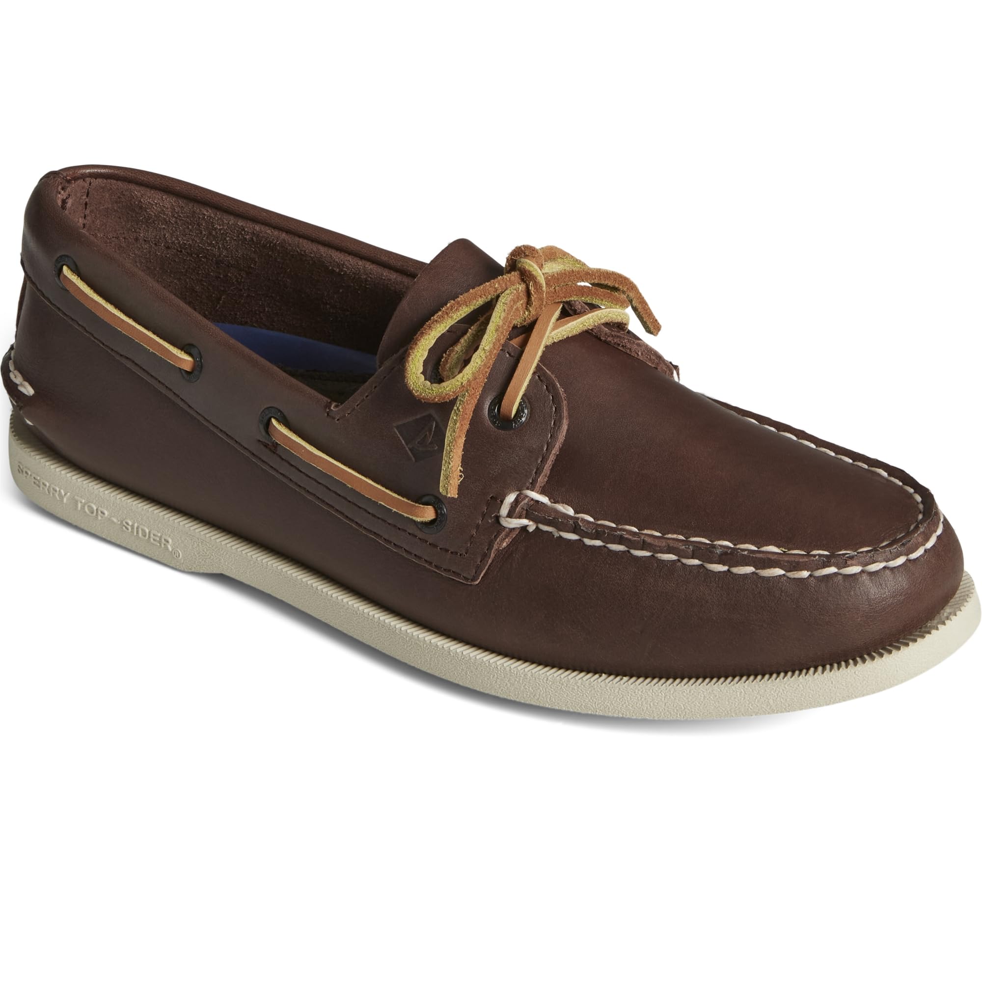 The Sperry A/O 2-EYE LEATHER - Mens is a classic brown leather boat shoe with white stitching, tan laces, side eyelets, and a light rubber sole for timeless nautical style and comfort in a low-cut slip-on design.