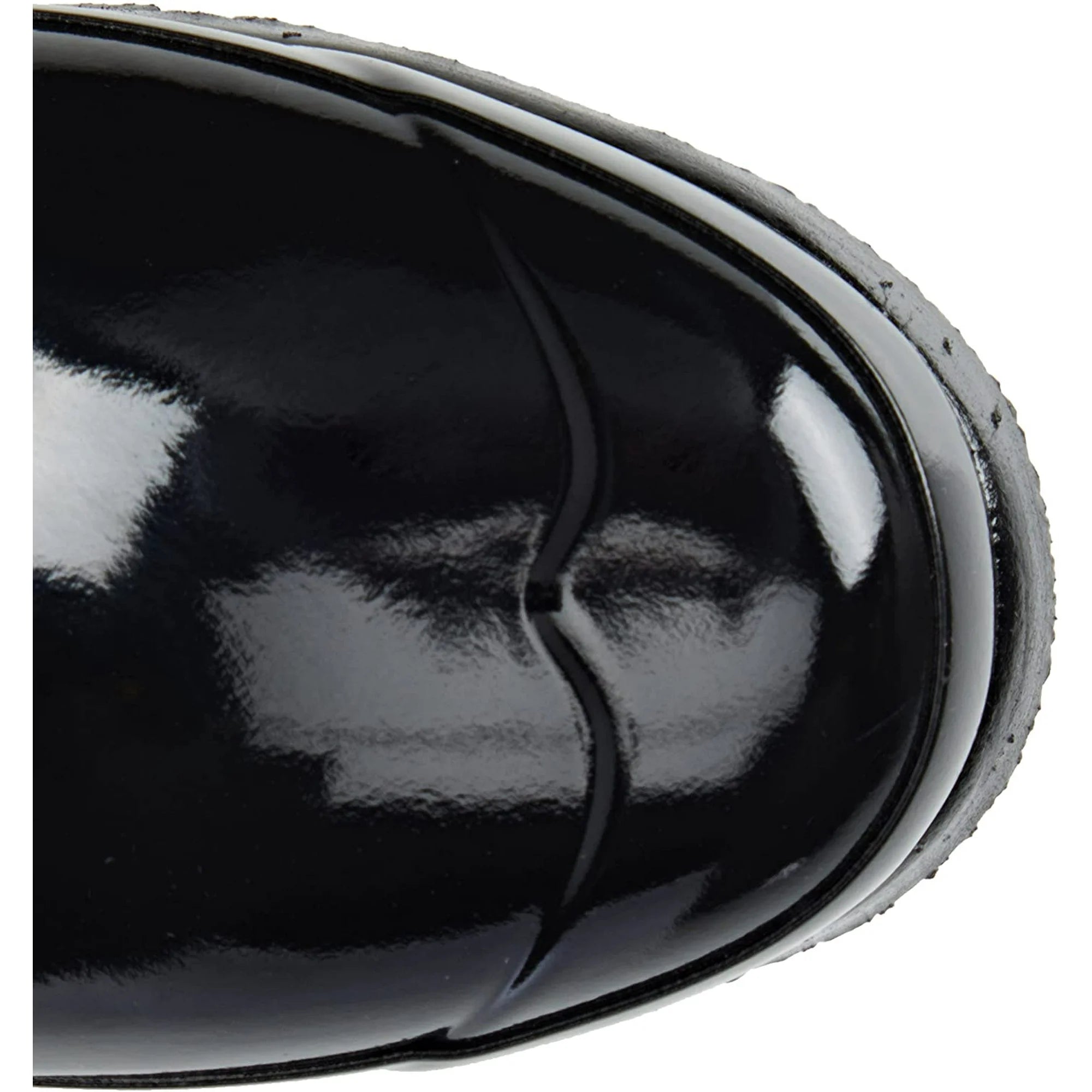 Close-up of the shiny black toe on the Hunter Original Short Gloss Rain Boots for women, highlighting light reflections and a textured gray sole.