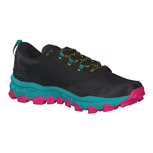 The ASICS GEL-FujiTrabuco 8 - Womens features a black upper, teal midsole, bright pink rugged outsole, and teal/yellow laces with a modern textured design and teal heel pull tab for easy wear.