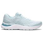 A light blue ASICS Cumulus 23 running shoe for women with a white sole, textured mesh upper, lace-up closure, subtle side branding, and lightweight cushioning for comfort.