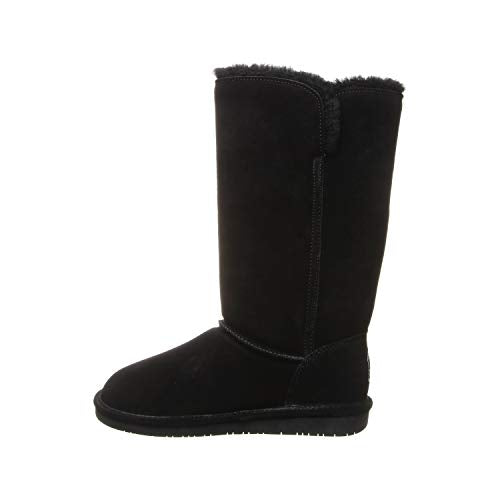 Shown in profile against a white background is the BEARPAW Lori Boots for women—a single black, mid-calf suede boot with a flat sole and soft sheepskin wool lining.