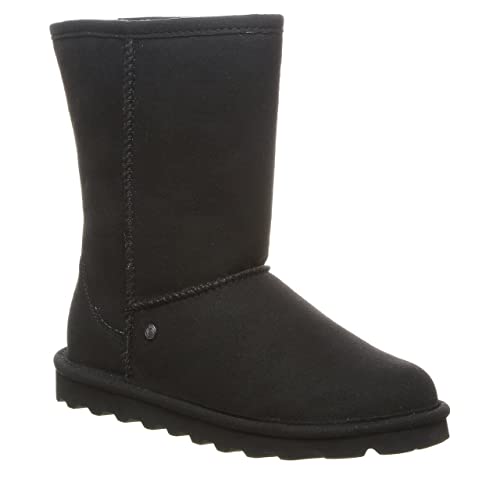 The BEARPAW Elle Short Vegan Boots for women are black micro suede winter boots featuring a mid-calf height, rounded toe, visible stitching, flat textured rubber sole, and NeverWet technology for extra protection.