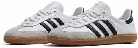 The adidas Samba Decon Shoes for men feature a leather upper, black three-stripe details, light gray suede toes, and gum rubber soles—offering a classic look.