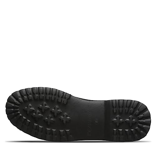 The image shows the black rubber sole of the BEARPAW Nick Boots - Mens, viewed from the bottom. The tread features large rectangular and cross-shaped patterns for traction, with BEARPAW branding embossed in the center.