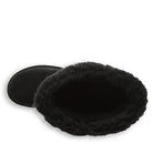 Top view of a single black BEARPAW Kendall Boot for women, featuring a plush, furry interior and cozy opening—ideal comfort after a relaxing day by Lake Tahoe.