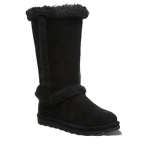Stay cozy in BEARPAW Kendall Boots for women, featuring black suede, plush faux fur trim, and a textured sole—perfect for warmth and style on your Lake Tahoe getaway.