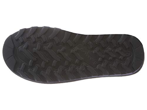 The image shows the bottom view of a black sole with a rugged, wavy tread for traction, featured on BEARPAW Phylly Boots – Womens winter boots with a cozy wool blend lining.