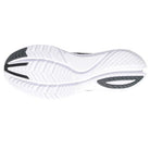 The image shows the white sole of the Saucony Kinvara 13 Running Shoe - Mens, highlighted by black tread accents and a wavy, textured pattern that enhances grip and flexibility.