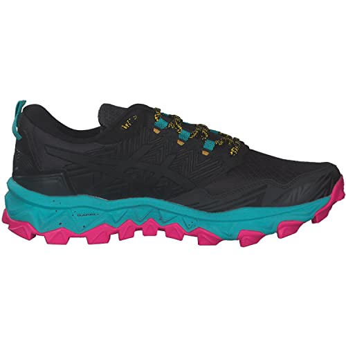 The ASICS GEL-FujiTrabuco 8 - Womens is a black trail running shoe featuring yellow-speckled laces, a teal midsole, and a rugged pink outsole with pronounced treads.